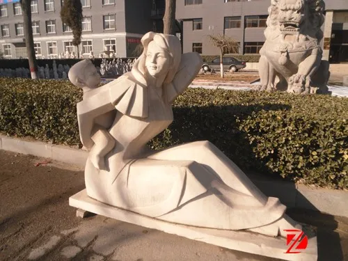 Mother and child marble statues