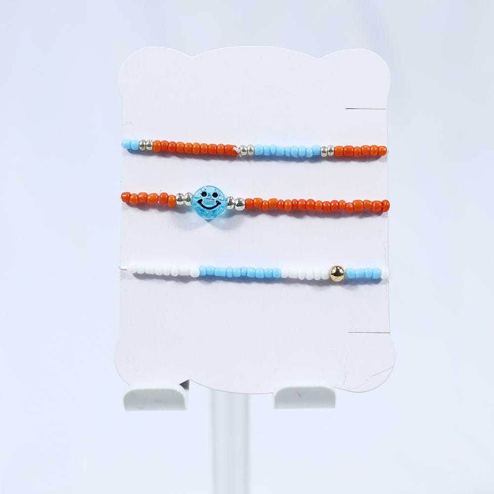 Brazalete de niños sonrientes azules