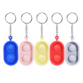 Fidget ysmụaka Push Pop Ọ Afụ Keychain Toy