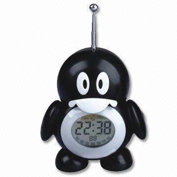 Digital Table Clock with Penguin Modeling and Radio, Measuring 9.4 x 12.3 x 6.2cm