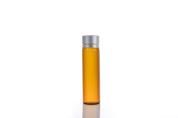 Glass essential oil bottle with secure lid