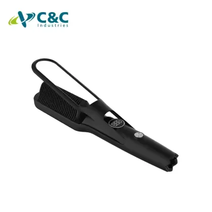 A portable hair straightening comb that prevents burns.