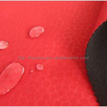 Stretch printed waterproof and breathable soft shell bonded fabric