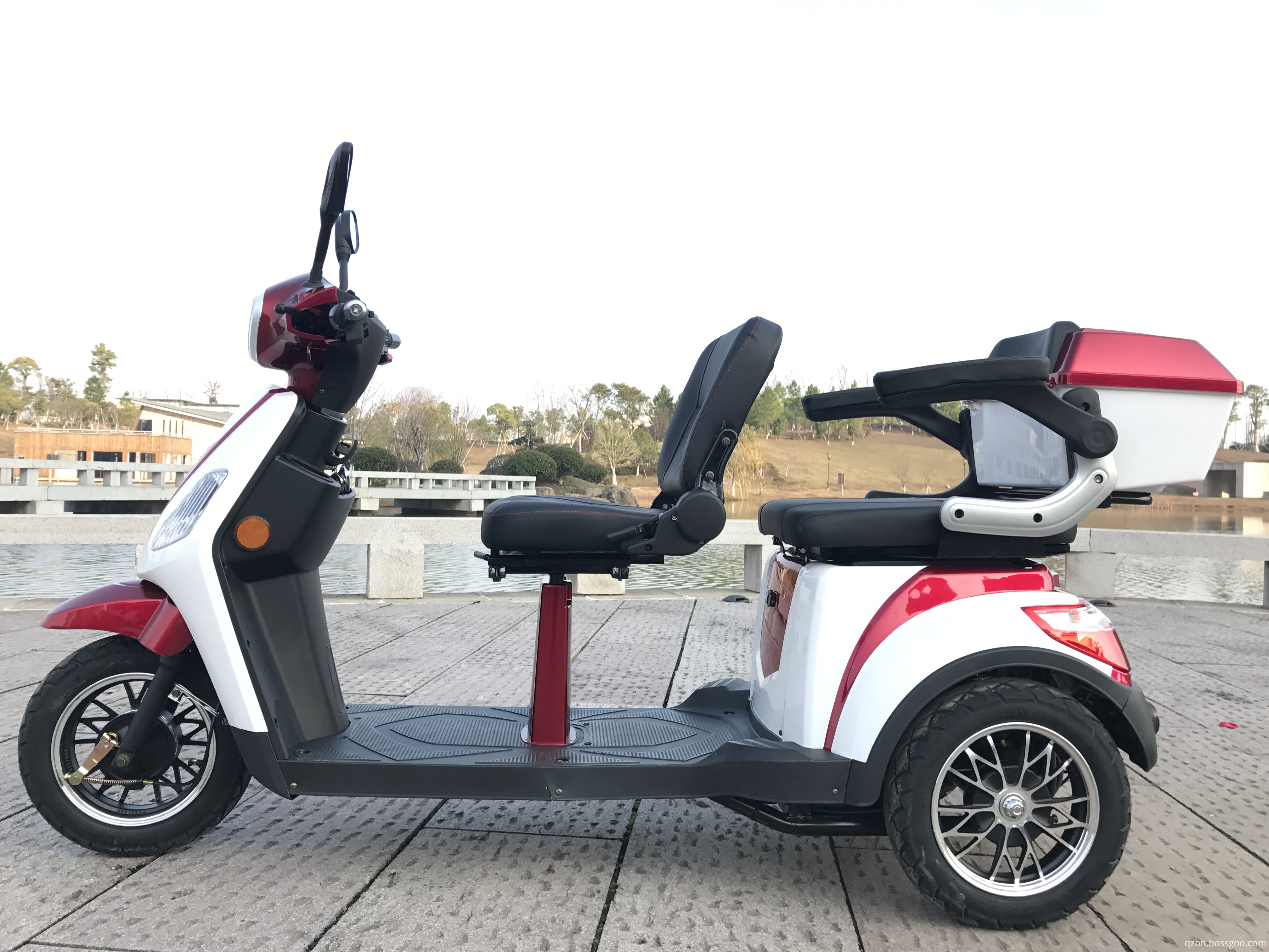 Two three-wheeled elderly scooters-1