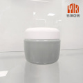Tarro de almacenamiento de crema para el cuidado de la piel de plástico gris brillante