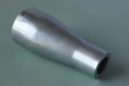 Metal shock absorber housing