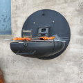 Griglie bbq in acciaio corten a parete nera