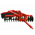 Disc ploughs harrows farmland Tractor