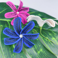 हस्तनिर्मित पोलिनेशियन टिएरे फूल बाल पिक