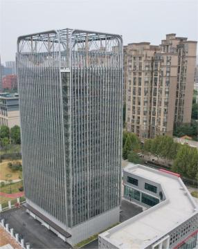 Multi-row vertical lift parking system