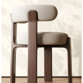Silla de madera maciza de fresno con tela.