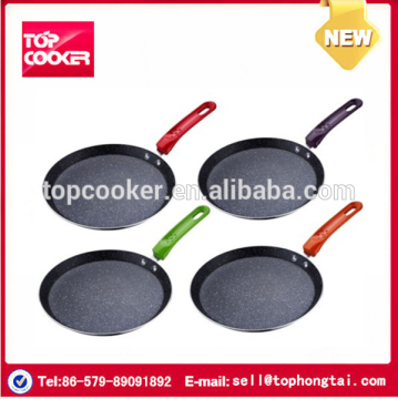 Stone coating pancake pan in cooking
