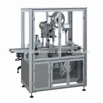 Cigarette box corner labeling machine