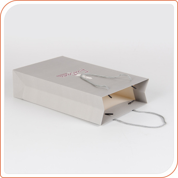 Wholesale Customzied Glossy Lamination White Paper Bag Gift Bag