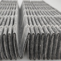 Material de filtro de ar não tecido laminado de carbono