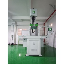 Vertical injection machine for sliding board