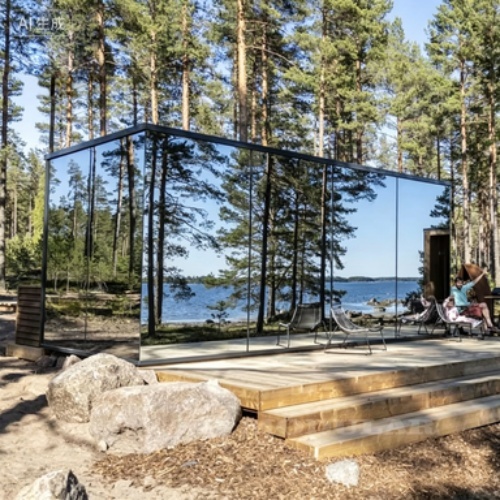 Lightweight Prefab Beach House with Reflective Design