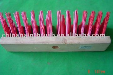 Broom brush with long wooden handle