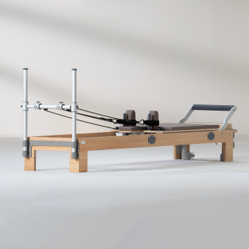 High-End Clinical Studio: Discover the Ultimate Pilates Experience with Wood Reformers and Advanced Machines
