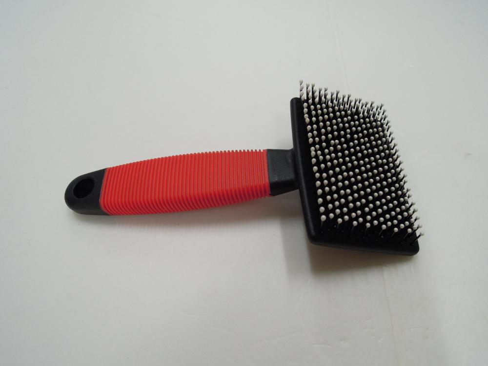 Poignée en caoutchouc en forme de T Brosse à chat en plastique pour chat