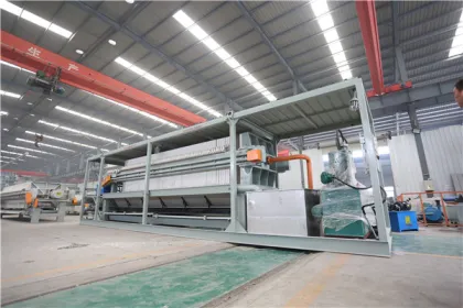 Conveying integrated filter press