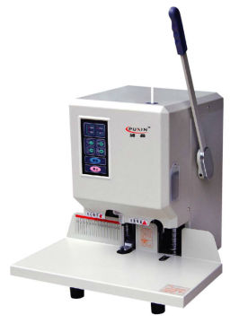 SEMI AUTOMATIC PUNCHING AND BINDING MACHINE