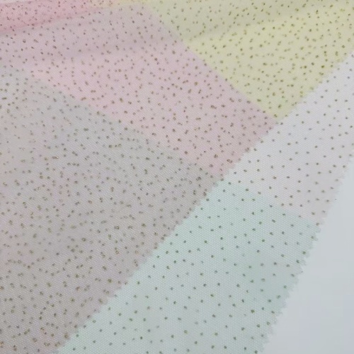 Rete in poliestere con stampa laminata a pois dorati a strisce sfumate