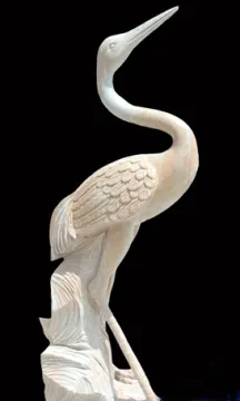 garden crane stone statue