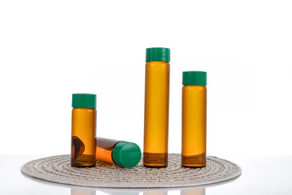 22mm plastic capped brown glass bottle