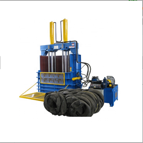 Waste paperboard baler machine