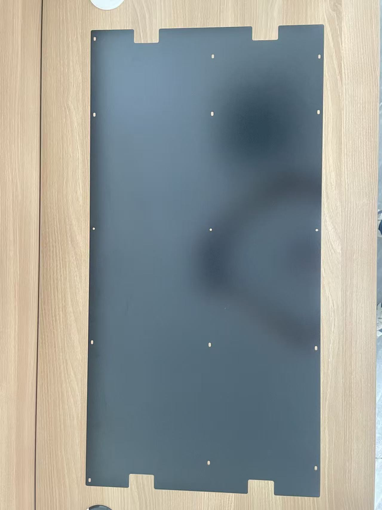 Papier isolant sur le capot supérieur du bloc d'alimentation