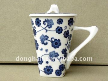 antique ceramic tea mug with strainer,