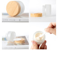 Wood grain glass frosted face cream bottled separately