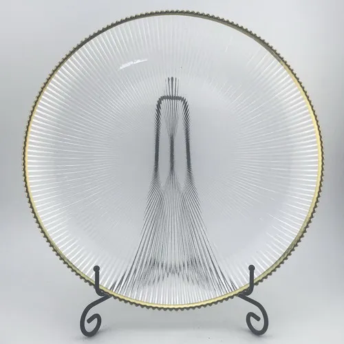 Clear glass plate dinner with gold rim