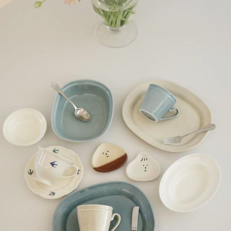 Blue and White Ceramic Dinnerware with Delicate Designs