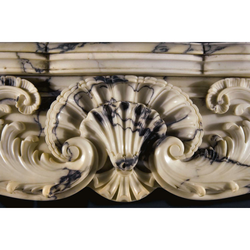 Elegant Stone Fireplace Surround with Copper Accents