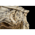 Elegant Stone Fireplace Surround with Copper Accents