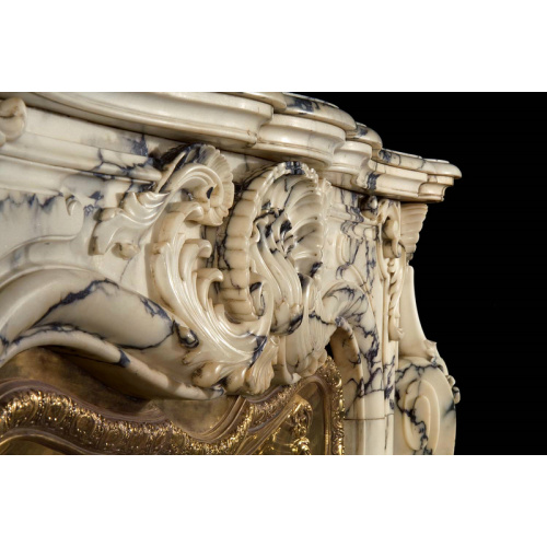 Elegant Stone Fireplace Surround with Copper Accents