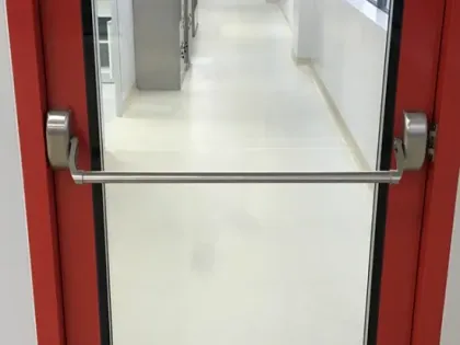 Glass fire escape door