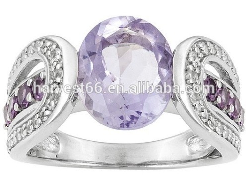 3.40ct Oval Bolivian Orchid Amethyst, 1.00ctw Round Rhodolite & .41ctw Round White Topaz Silver Ring