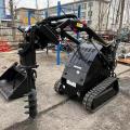 Skid Steer Loader dengan palu hidrolik