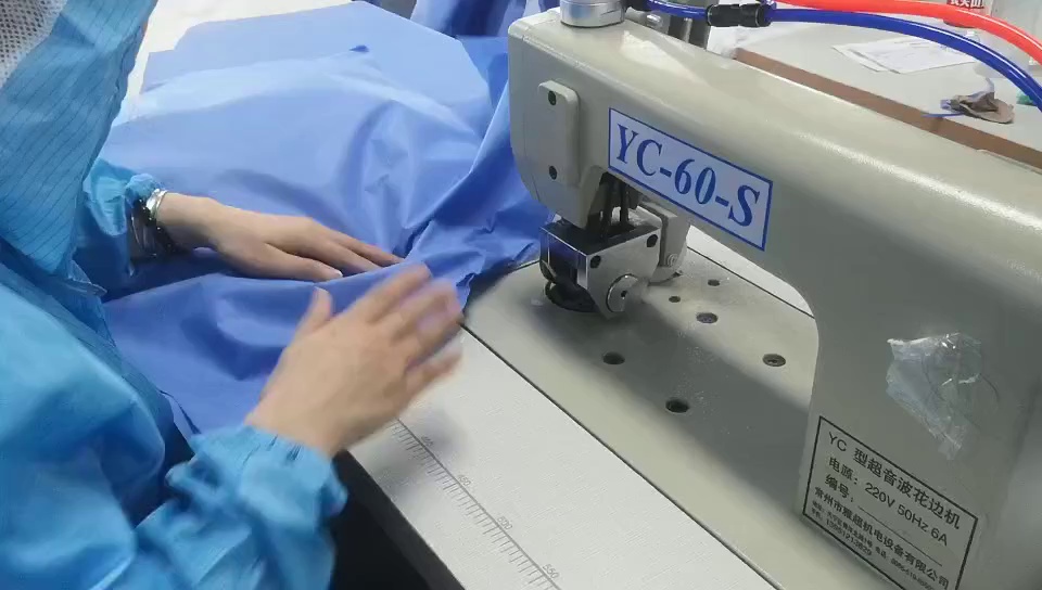 CE En 13795 Sterilization Ultrasonic Heat Sealing Disposable Surgical Gowns