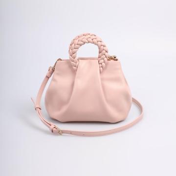 Pink dumpling handbag w/ woven handles