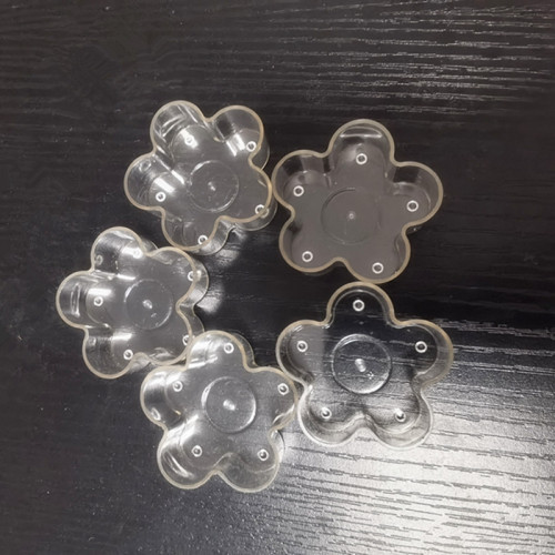 Flower shape plastic up for candle