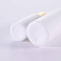 Cylinder white glass serum bottle with golden dropper