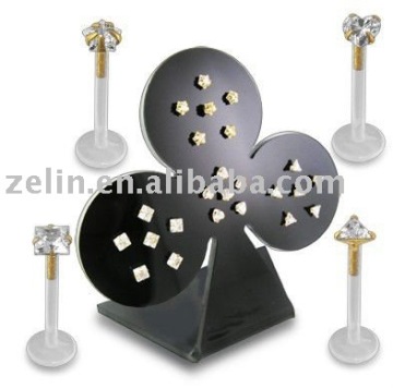 Bioplast labret jewelry with gold plated in a display body lip ring