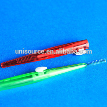 Plastic hand push type interdental brush