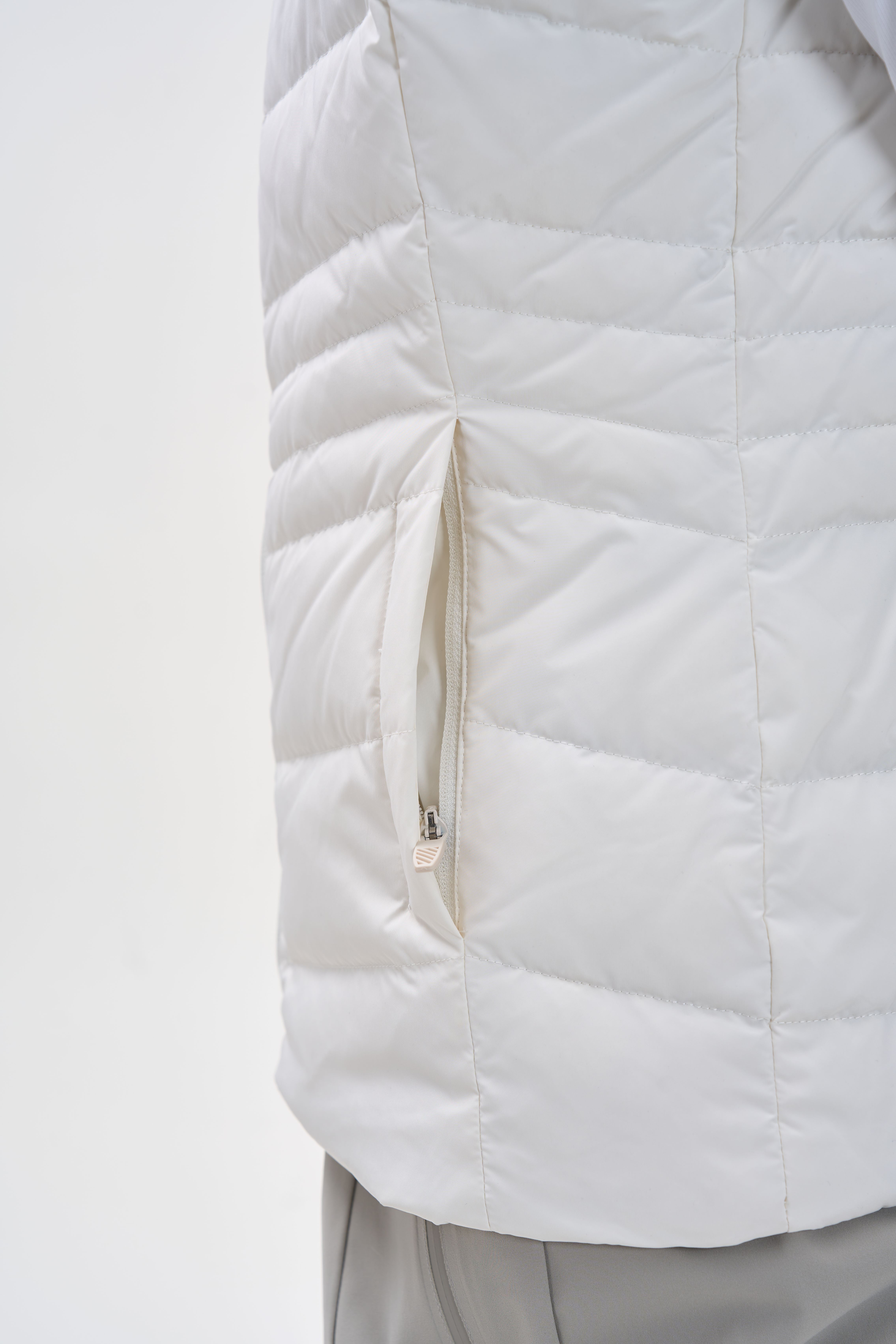 Down vest with zipper pockets