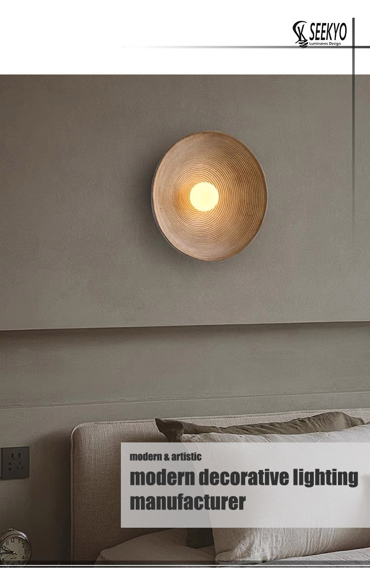 A wabi-sabi style wall lamp with a minimalist design and an old treatment surface