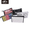 Geometric rhombus multicolor leather cosmetic bag